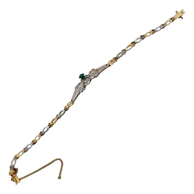 14 Karat Two-Toned Emerald Fancy Link Bracelet .66 Total Diamond Weight