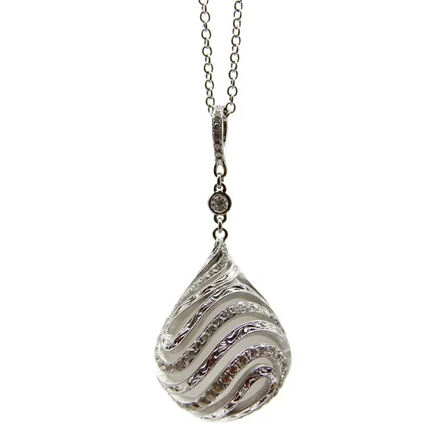 1990s 18k White Gold Diamond Drop Rock Crystal Necklace With Hand Engraved Cage Setting